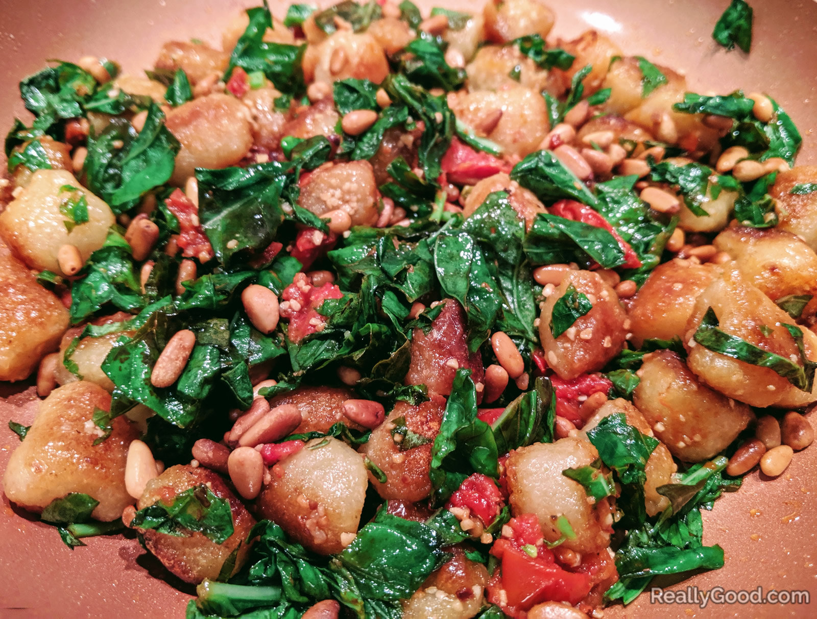 Cauliflower gnocchi with basil and peppers