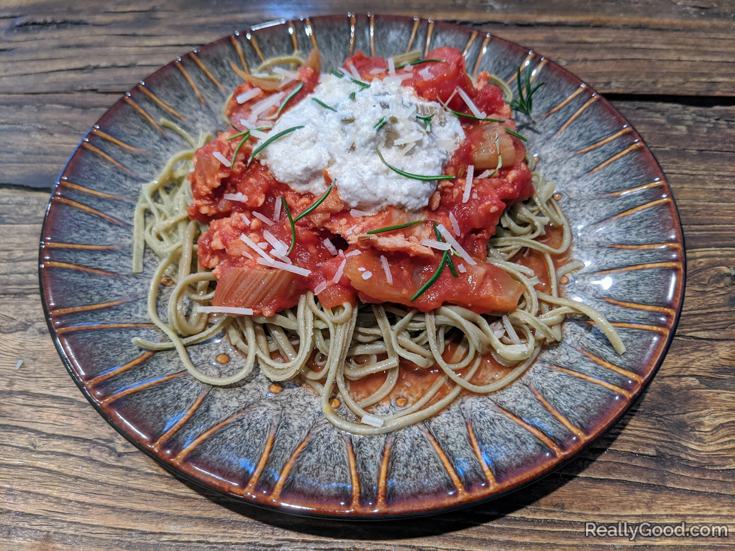 Edamame noodles, tomato sauce, vegetables, and ricotta cheese
